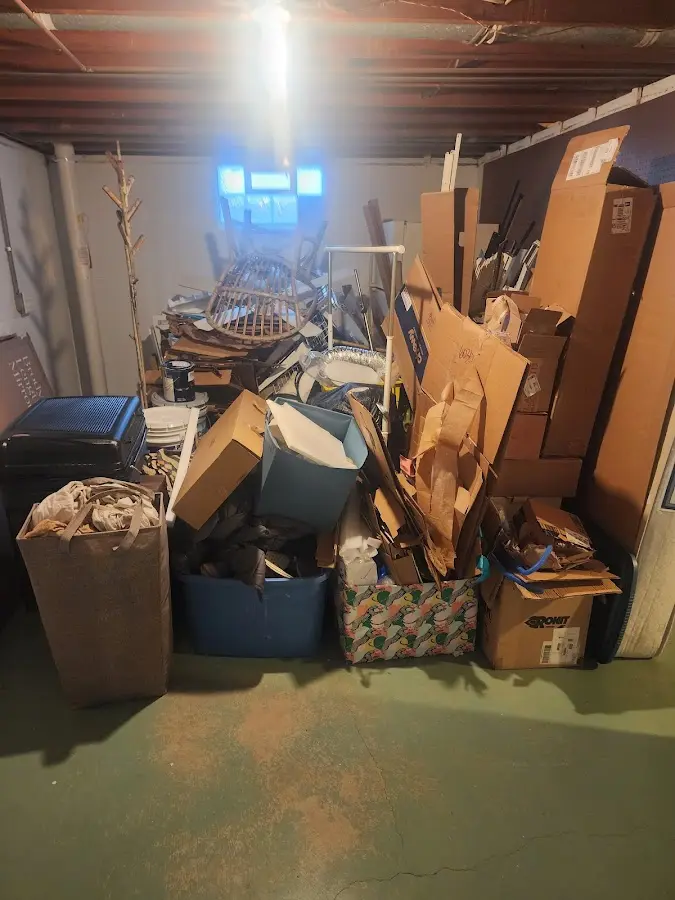 Roll-off dumpster container at job site for 6 Yard Dumpster Rental in Woodcrest